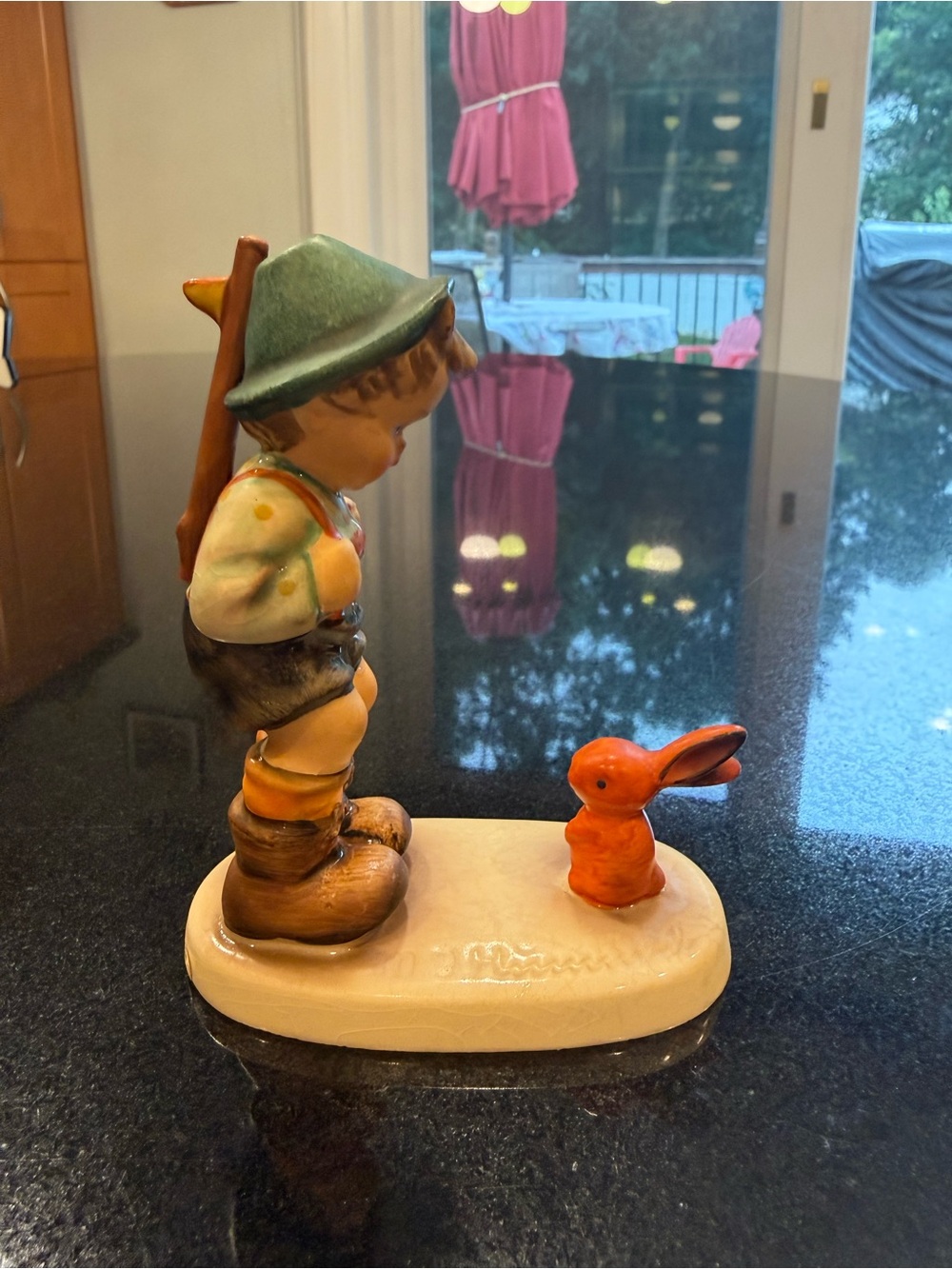 Goebel Hand-Painted Figurine Boy with Orange Rabbit on Cream Base